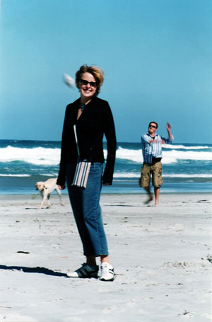 Caroline playing with her brother James and her dog Mobi on the beach at St Clair, Dunedin, March 2003.