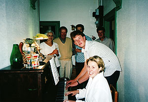 Caroline and her brother Edward playing her piano at 78 Walton St.