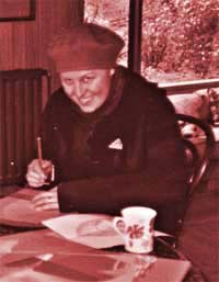 Caroline writing at the family kitchen table, 2000.